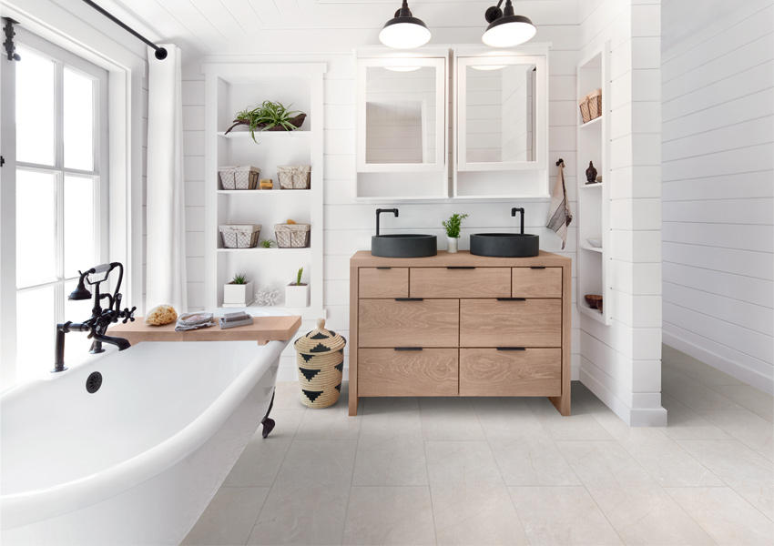 Waterproof luxury vinyl tile flooring in bathroom with modern decor.